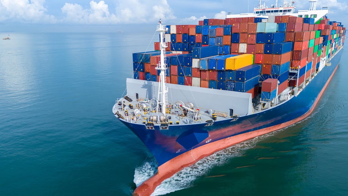 Aerial view of cargo ship with colorful containers